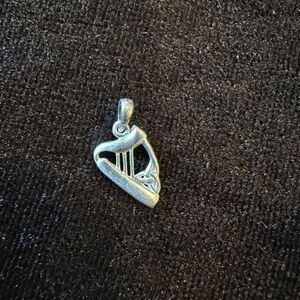 Silver harp trinity knot pendant
